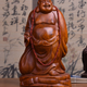 Illustration for article titled Ý nghĩa của tượng Di Lặc bằng gỗ Hương